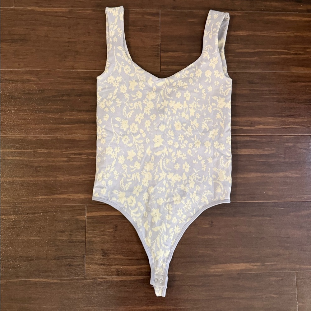 Free People Intimately light purple floral bodysuit in size XS/S